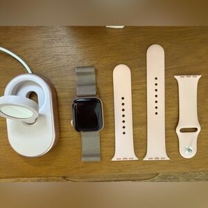 AppleWatch Series 5 in Rose Gold with Gold/Pink Wristband and Charger Holder